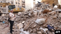 Dagestan deputy Mufti Shehabeddin Husseinov inspects the damage to a building hit in an Israeli airstrike in Beirut's Basta neighborhood on Oct. 17, 2024.