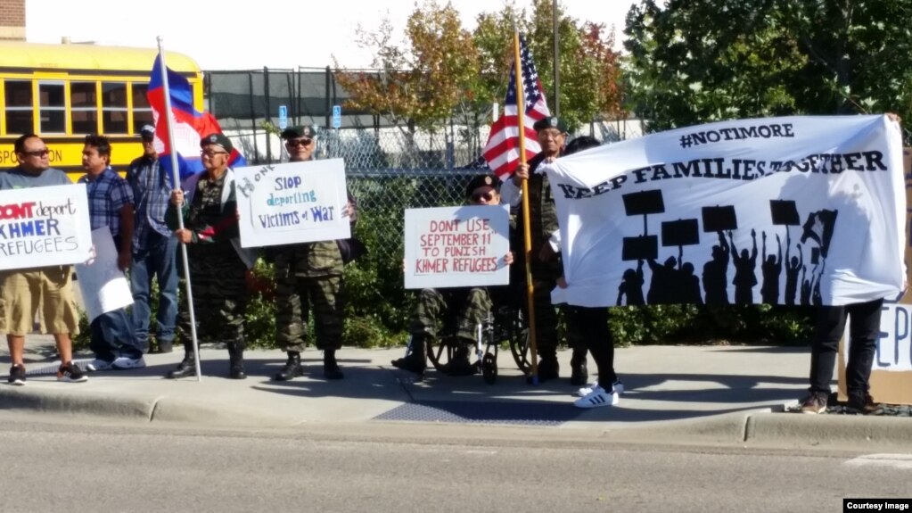 More than 120 protesters gathered in front of the U.S. Immigration and Customs Enforcement Office to petition to allow eight Cambodian American who are facing deportation to stay with their families in Minnesota, Monday, September 26, 2016. (Courtesy of IKARE) 