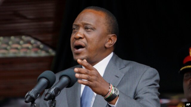 FILE - Kenyan President Uhuru Kenyatta delivers a speech at the Nyayo National Stadium in Nairobi, Oct. 20, 2014.