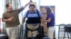 Robotic Suit Helps Paralyzed Man Walk