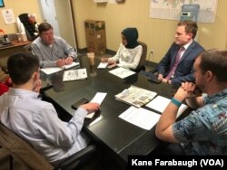 WHBF-TV News Director Mike Mickle and the news team discuss potential assignments at a morning editorial meeting.