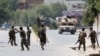 10 Killed as Suicide Bombers Raid Afghan Education Office