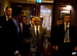 Former U.N. secretary general and chairman of the Advisory Commission on Rakhine state Kofi Annan, center, arrives for a press briefing on the final report on Rakhine state, Aug. 24, 2017, in Yangon, Myanmar.