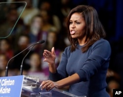 FILE - First lady Michelle Obama speaks during a campaign rally for Democratic presidential candidate Hillary Clinton in Manchester, N.H., Oct. 13, 2016.