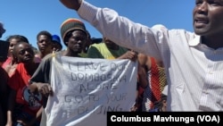 People in Domboshava,district a rocky area about an hour drive northeast of Harare are mobilizing on May 6, 2019, against a Chinese company's move to open a quarry mine here.