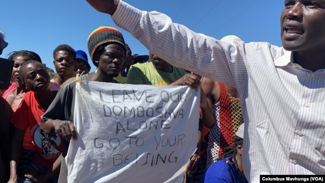 People in Domboshava,district a rocky area about an hour drive northeast of Harare are mobilizing on May 6, 2019, against a Chinese company's move to open a quarry mine here.