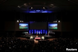 Jay Smith plays the bagpipe during ? memorial service for U.S. Senator John McCain at North Phoenix Baptist Church in Phoenix, Arizona, Aug. 30, 2018.