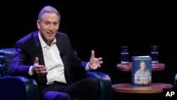 FILE - Former Starbucks CEO Howard Schultz speaks at an event to promote his book, "From the Ground Up," in Seattle, Washington, Jan. 31, 2019.