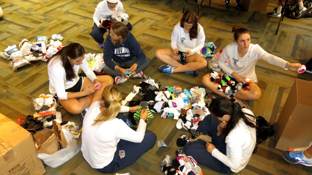 UPS employees donate over 10,500 pairs of socks to Louisville homeless  shelter