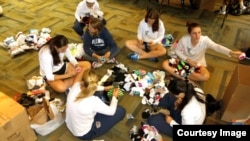 Students at Villanova University sort donated socks later to be distributed to homeless shelters.