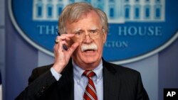 FILE - National security adviser John Bolton speaks during a briefing at the White House, Aug. 2, 2018, in Washington. 