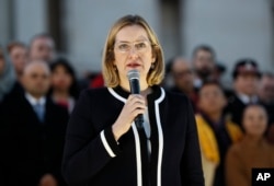 FILE - Britain's Home Secretary Amber Rudd speaks during a vigil in Trafalgar Square, London, March 23, 2017.