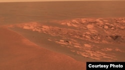 A view of the surface of Mars taken at the "Intrepid" crater by the Opportunity Mars Rover on November 11, 2010. (NASA/JPL-Caltech/Cornell University)