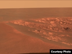 A view of the surface of Mars taken at the "Intrepid" crater by the Opportunity Mars Rover on November 11, 2010. (NASA/JPL-Caltech/Cornell University)