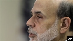 Federal Reserve chairman Ben Bernanke addresses a Federal Reserve conference, in Boston, 15 Oct 2010