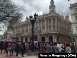 Crowds gather outside the Gran Teatre in Havana, Cuba, March 21, 2016. On Tuesday, U.S. President Barack Obama is scheduled to address Cubans in a national speech from the theater.