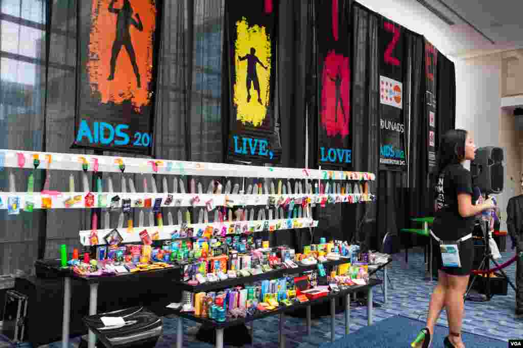 A display is set up in the Convention Center by The CONDOMIZE! Campaign. The campaign is a joint program of the United Nations Population Fund; its goals are to de-stigmatize and encourage access to condoms around the world. (Alison Klein/VOA)