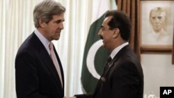 U.S. Senator John Kerry and Pakistan Prime Minister Yusuf Raza Gilani prior to official talks in Islamabad shortly after U.S. special forces killed Osama bin Laden in Abbottabad in May 2011 (file photo).