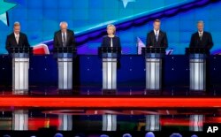 Democratic presidential candidates take the stage for the CNN Democratic presidential debate in Las Vegas, Nevada, Oct. 13, 2015.