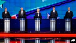 Democratic presidential candidates take the stage for the CNN Democratic presidential debate in Las Vegas, Nevada, Oct. 13, 2015.