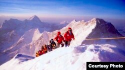 Yuichiro Miura on his way to the summit of Mount Everest, along the Nepal-Tibet border, May 2003 (Courtesy of Miura Dolphins).