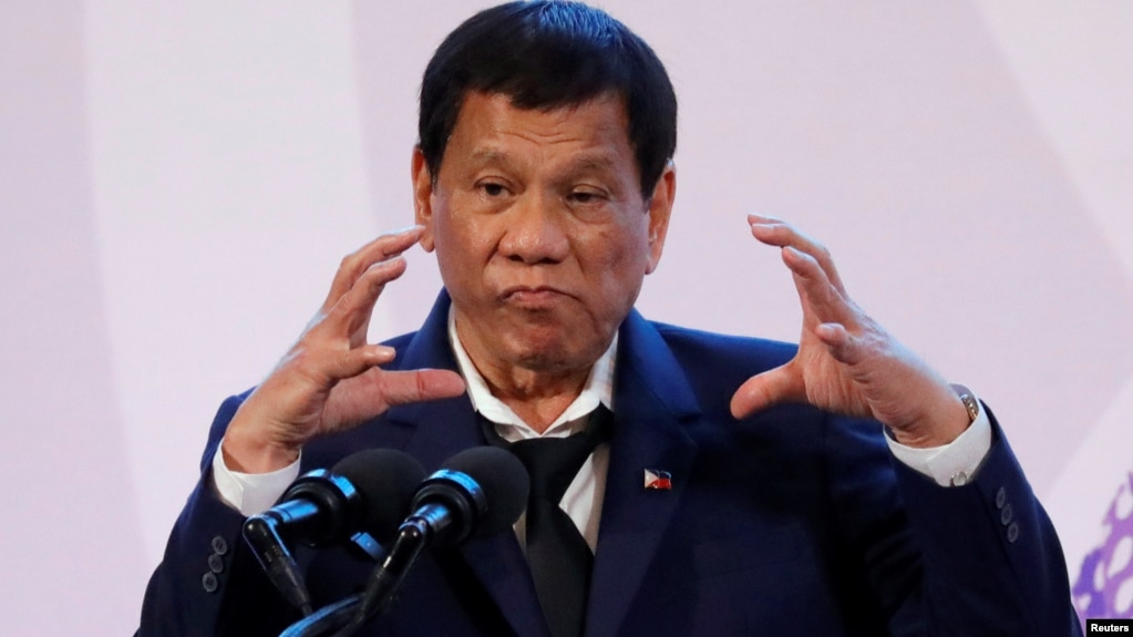 FILE - Philippines' President Rodrigo Duterte gestures during a news conference on the sidelines of the Association of South East Asian Nations summit in Pasay, metro Manila, Philippines, Nov. 14, 2017. 