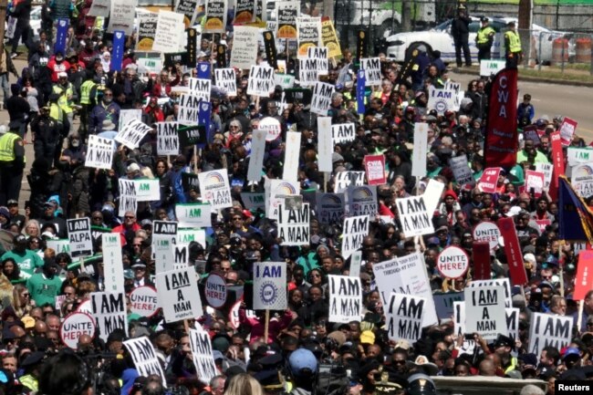 People participate in a march commemorating the 50th anniversary of the death of civil rights leader Martin Luther King Jr. in Memphis, Tenn., April 4, 2018.