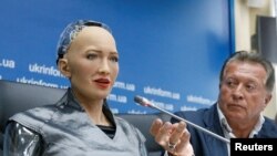 In this file photo, Hanson Robotics’ latest and most advanced robot Sophia attends a news conference after a meeting with young inventors and officials in Kiev, Ukraine October 11, 2018. (REUTERS/Valentyn Ogirenko )