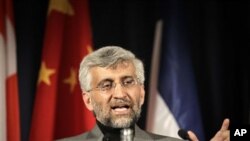 Iran's chief negotiator Saeed Jalili gestures during a press conference in Geneva, Switzerland, 07 Dec 2010