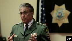 FILE - San Francisco Sheriff Ross Mirkarimi gestures during an interview, July 6, 2015, in San Francisco.
