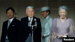Left to right, Japan's Crown Prince Naruhito, Emperor Akihito, Crown Princess Masako and Empress Michiko acknowledge well-wishers who gathered to celebrate the monarch's 80th birthday at the Imperial Palace in Tokyo, Japan, Dec. 23, 2013.