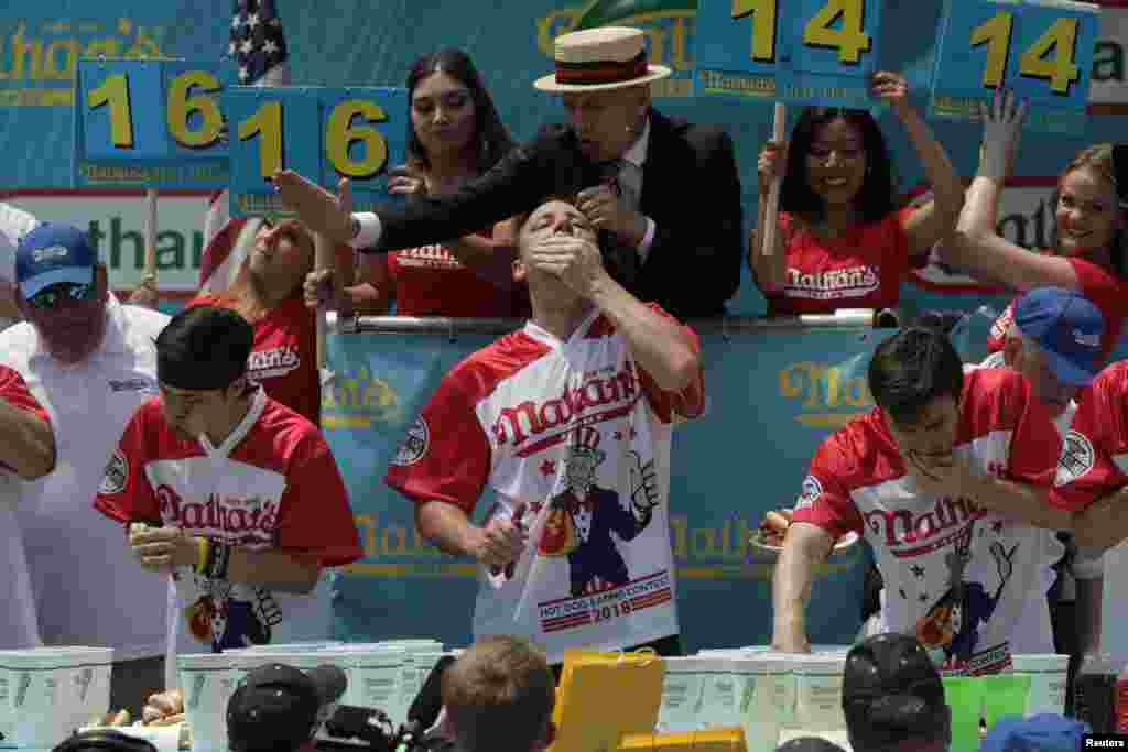 Joey Chestnut wins the annual Nathan&#39;s Hot Dog Eating Contest, setting a new world record by eating 74 hot dogs in Brooklyn, New York City, July 4, 2018.