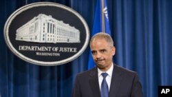 Umushikiranganji ajejwe ubutungane muri Amerika, Eric Holder