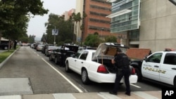 Police work at the scene of a shooting at the University of California, Los Angeles, June 1, 2016. 