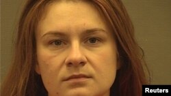 Maria Butina appears in a police booking photograph released by the Alexandria Sheriff's Office in Alexandria, Virginia, August 18, 2018.