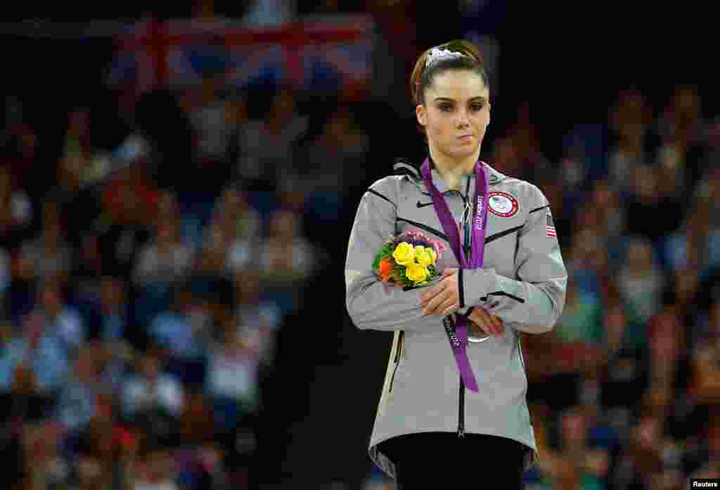 August 5: McKayla Maroney of the U.S. with her silver medal in the women&#39;s vault victory ceremony during the London 2012 Olympic Games. 