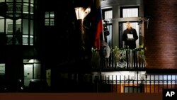 Julian Assange, founder of WikiLeaks speaks from a balcony at the Ecuadorian Embassy in London, December 2012.