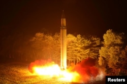 FILE - Intercontinental ballistic missile (ICBM) Hwasong-14 is pictured during its second test-fire in this undated picture provided by KCNA in Pyongyang on July 29, 2017.