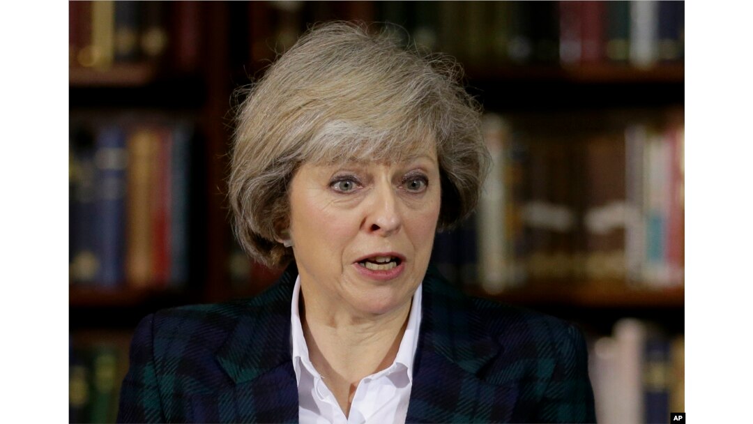 FILE - Britain's Home Secretary Theresa May launches her leadership bid for Britain's ruling Conservative Party in London, June 30, 2016.