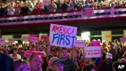 FILE - Supporters of Republican presidential candidate Donald Trump listen to him speak during a campaign rally at Lackawanna College in Scranton, Pennsylvania, Nov. 7, 2016.