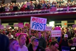 Supporters of Republican presidential candidate Donald Trump listen to him speak during a campaign rally at Lackawanna College in Scranton, Pennsylvania, Nov. 7, 2016.