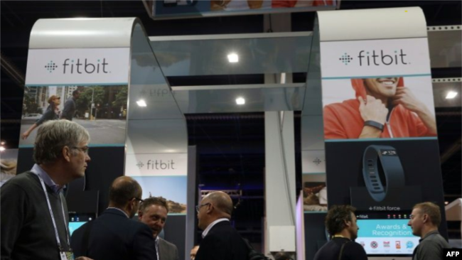 Fitbit is working with researchers on projects that could allow for early detection of diseases such as COVID-19 (AFP Photo/JUSTIN SULLIVAN)