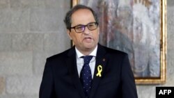 Le nouveau président de la région Catalogne, l'indépendantiste Quim Torra, lors d'une cérémonie officielle de prestation de serment au Palais de la Generalitat à Barcelone le 17 mai 2018. AFP PHOTO / POOL / Alberto Estévez