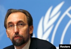 FILE - Jordan's Prince Zeid Ra'ad Zeid al-Hussein, U.N. High Commissioner for Human Rights, pauses during a news conference at U.N. European headquarters in Geneva, Oct. 16, 2014.