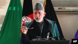 Afghan President Hamid Karzai, speaking at the National Military Academy in Kabul, March 22, 2011