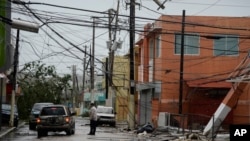 La red elétrica en Puerto Rico ha quedado completamente destruida tras el paso del huracán María como puede verse en esta foto tomada en Humacao, al oriente de Puerto Rico.