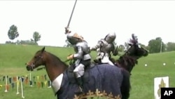 Professional jousters displaying skills of arms and horsemanship in Angola, Indiana.