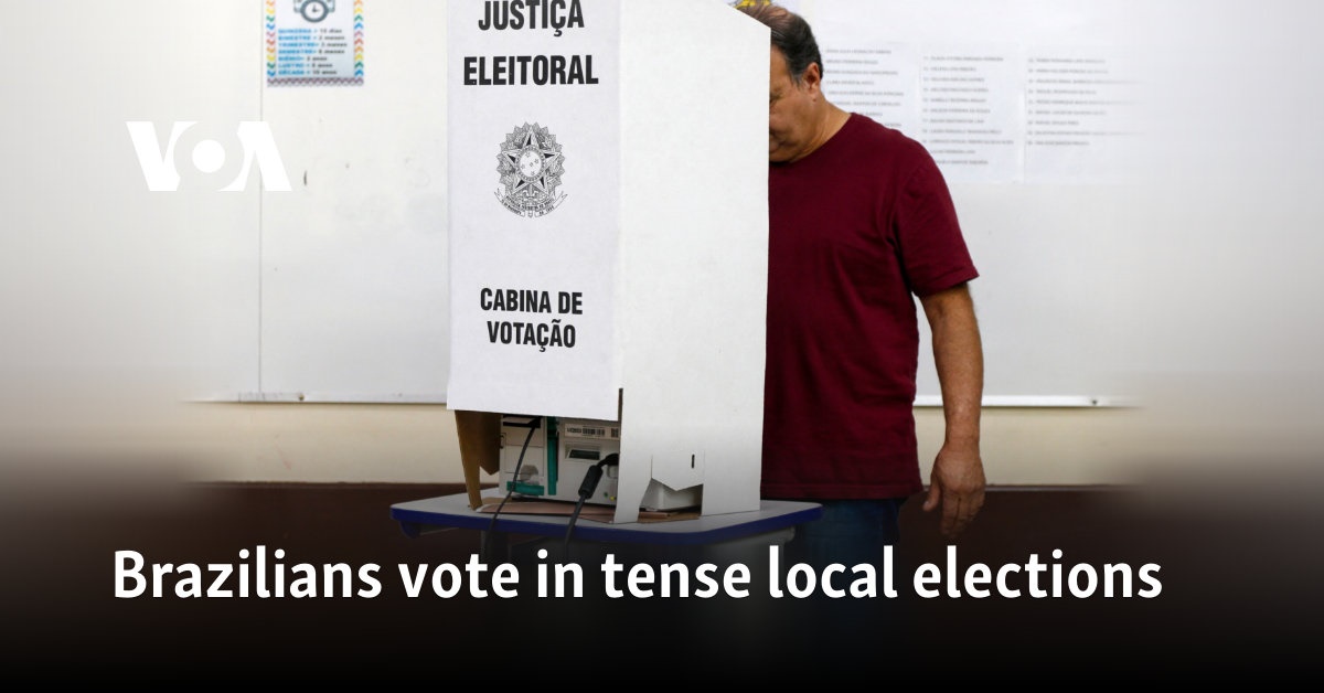 Brazilians vote in tense local elections