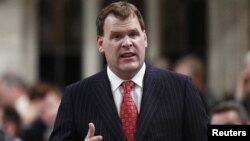 Canada's Foreign Minister John Baird speaks during Question Period in the House of Commons on Parliament Hill in Ottawa, May 29, 2012.