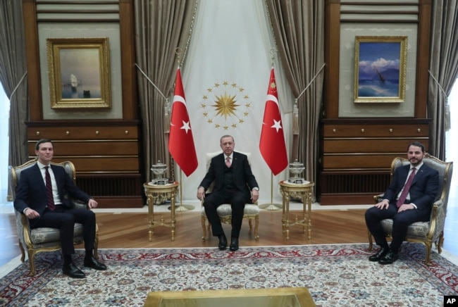 Turkey's President Recep Tayyip Erdogan, center, Turkey's Economy Minister Berat Albayrak, right, who is also his son-in-law, meet with Jared Kushner, left, U.S. President Donald Trump's adviser and son-in-law, at the Presidential Palace in Ankara, Turkey